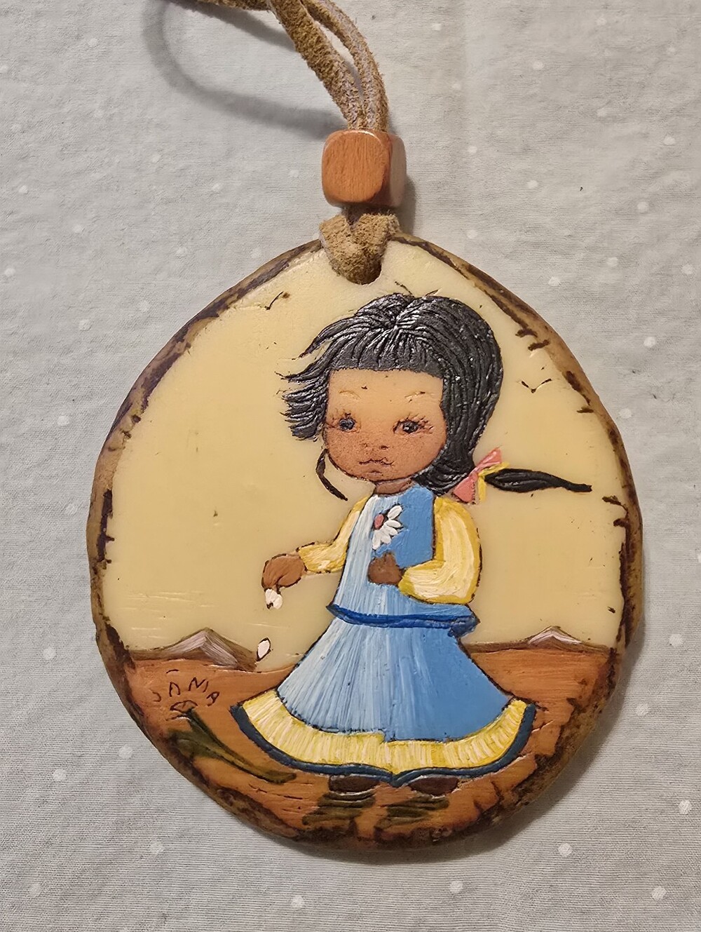 Vintage 1970s Hand-Painted Pendant Signed JAMA – Native Child in Blue